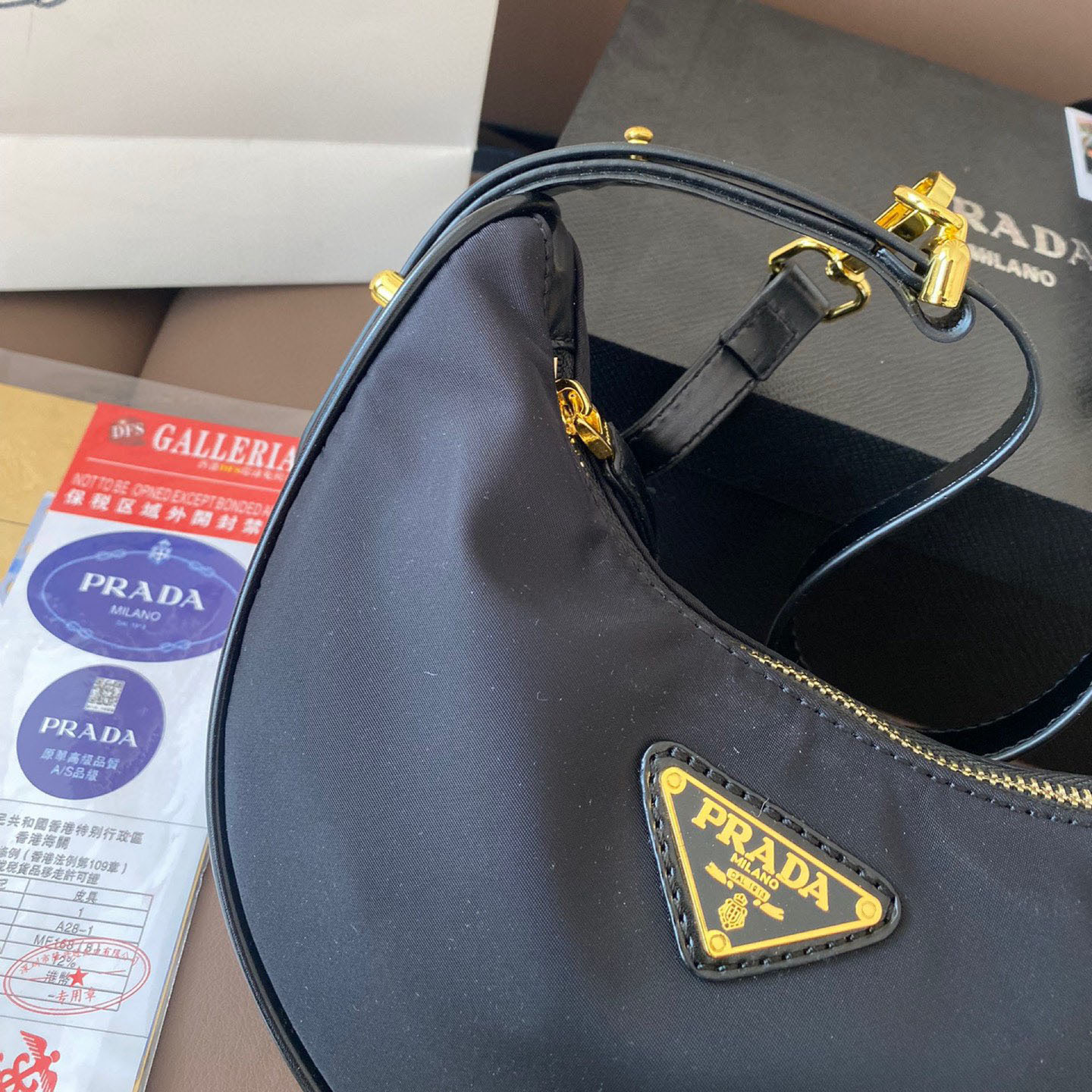 Arqué small leather shoulder bag