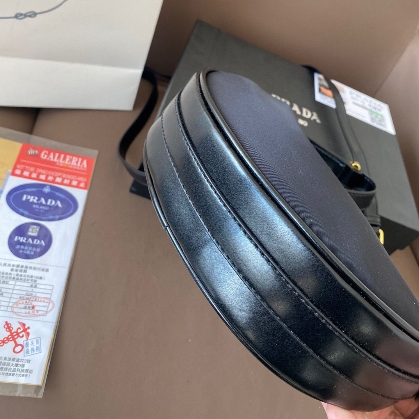 Arqué small leather shoulder bag