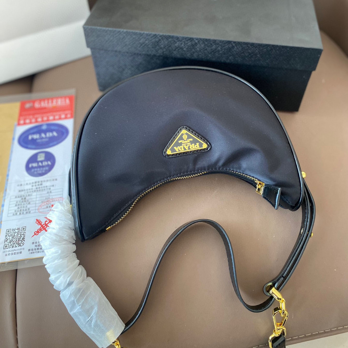 Arqué small leather shoulder bag