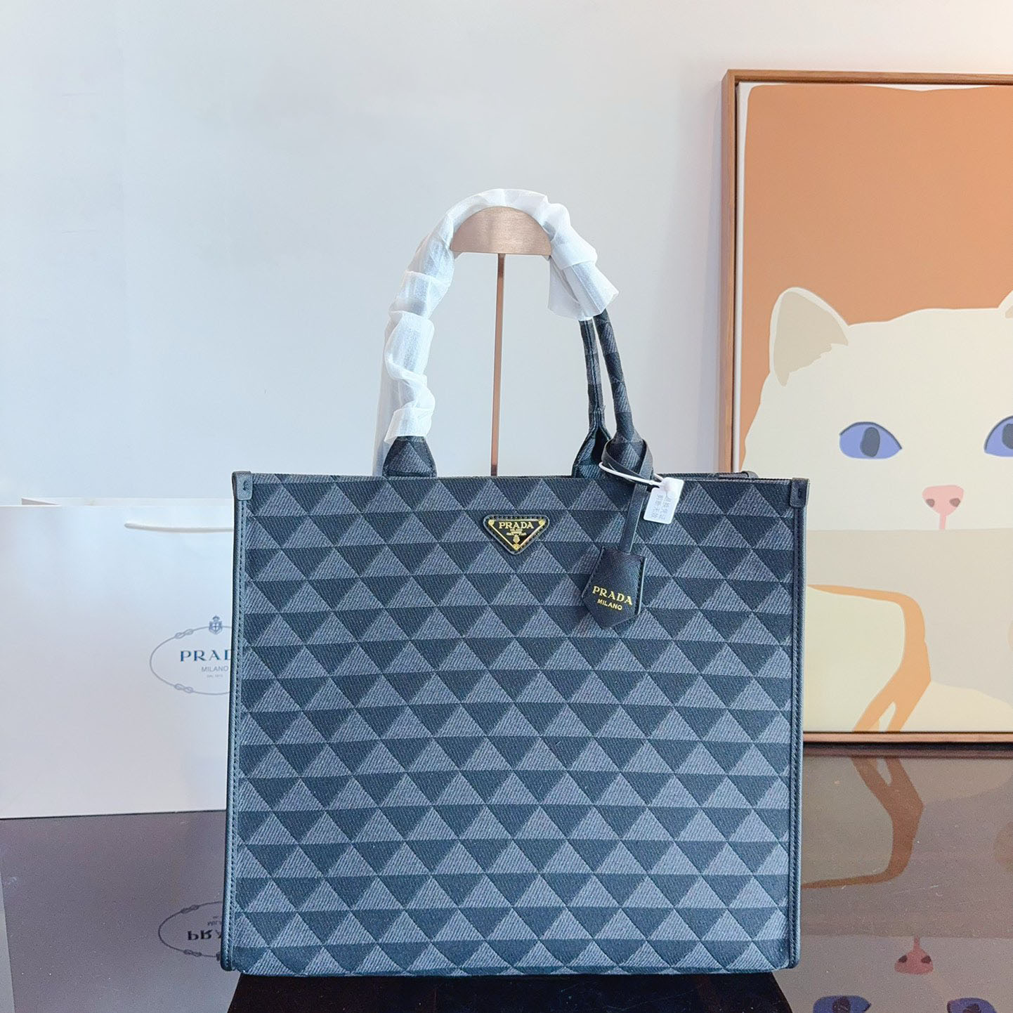 Symbole embroidered fabric handbag