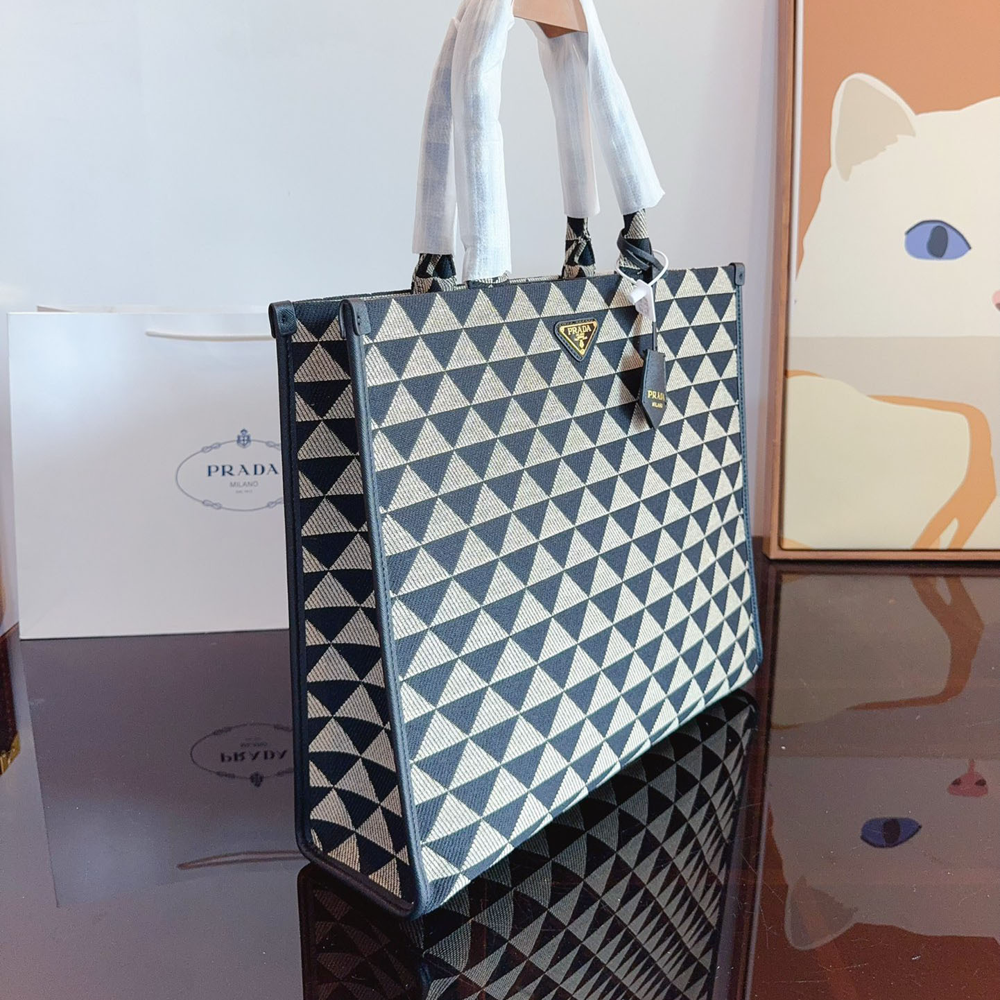 Symbole embroidered fabric handbag