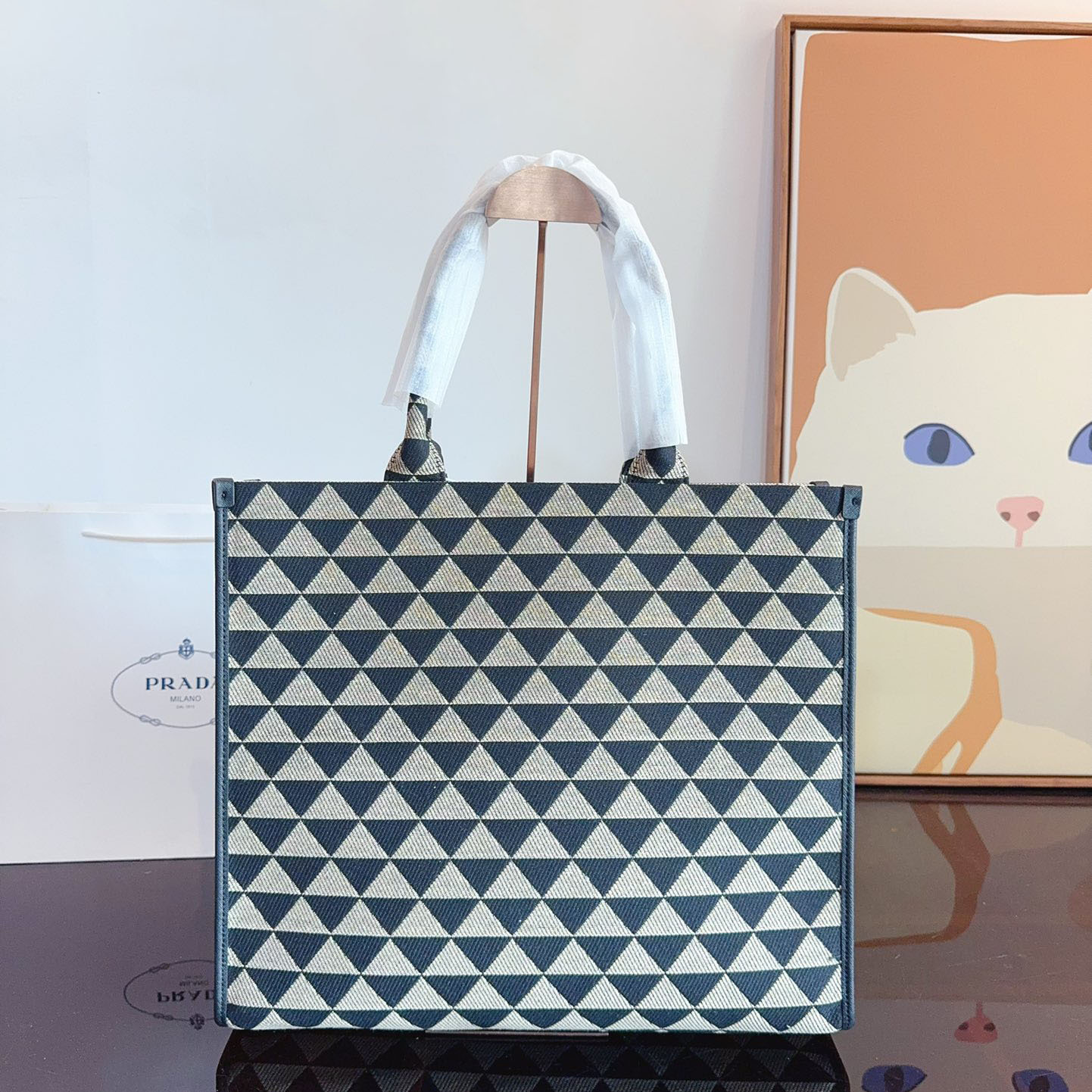 Symbole embroidered fabric handbag