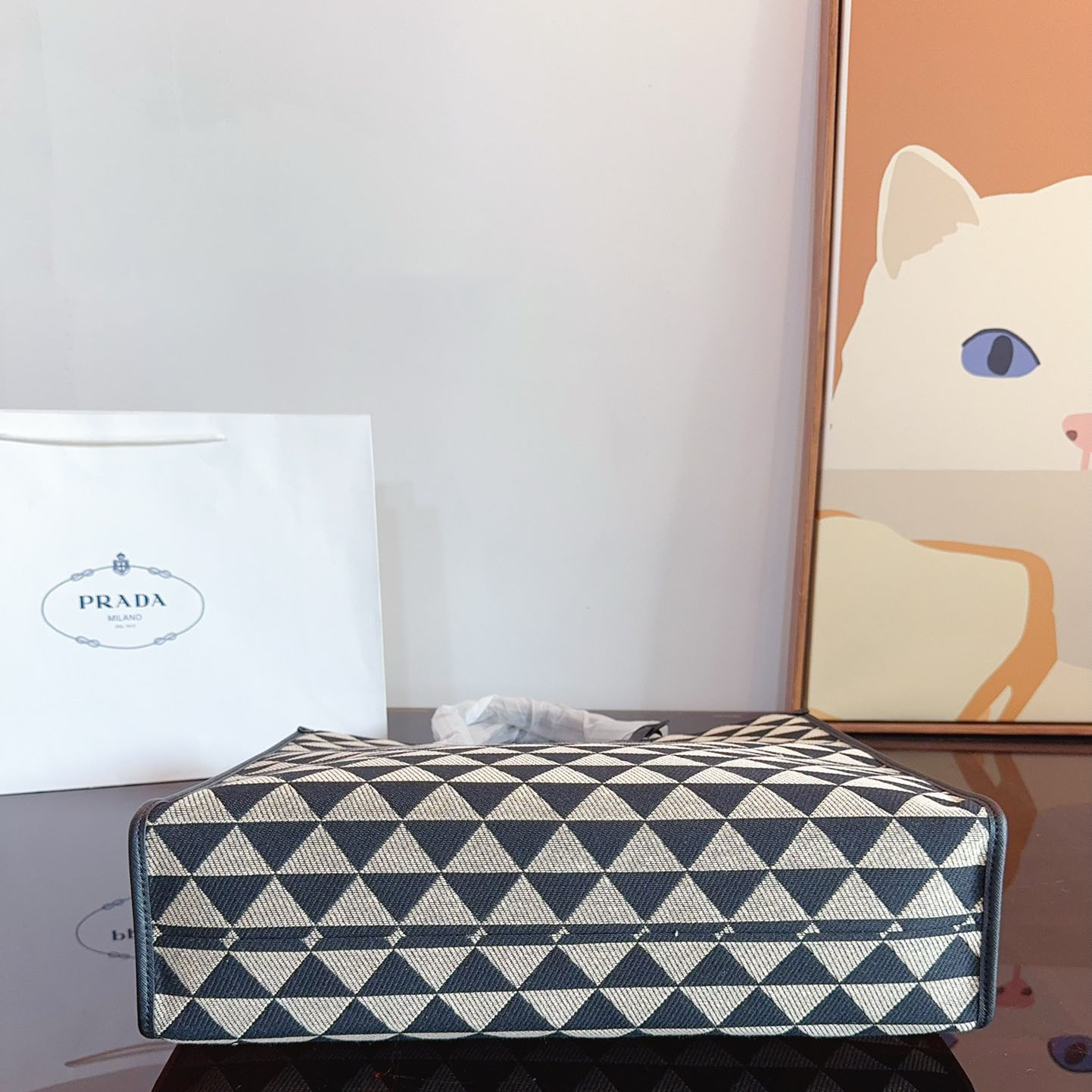 Symbole embroidered fabric handbag