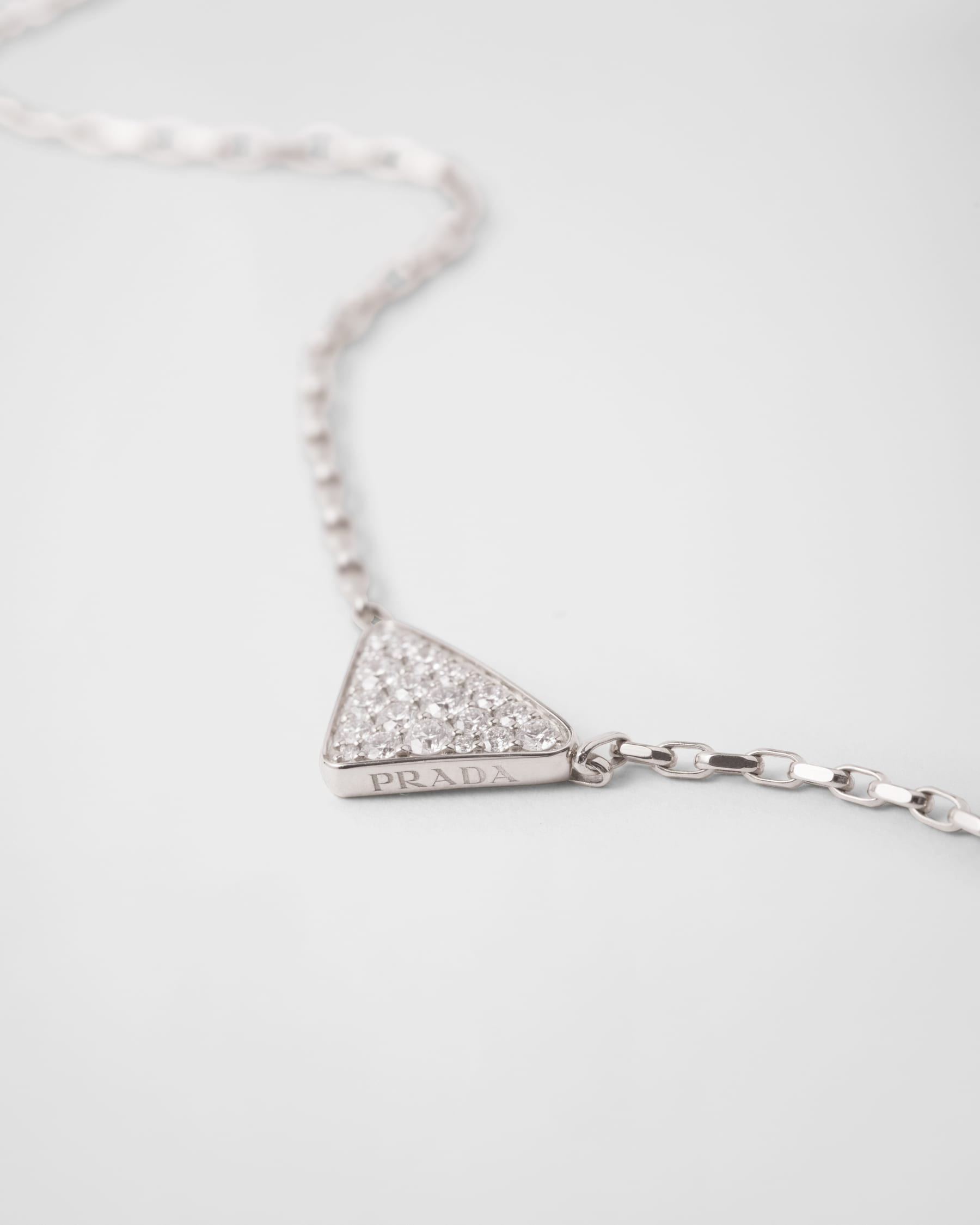 Eternal Gold mini triangle pendant necklace in white gold and diamonds