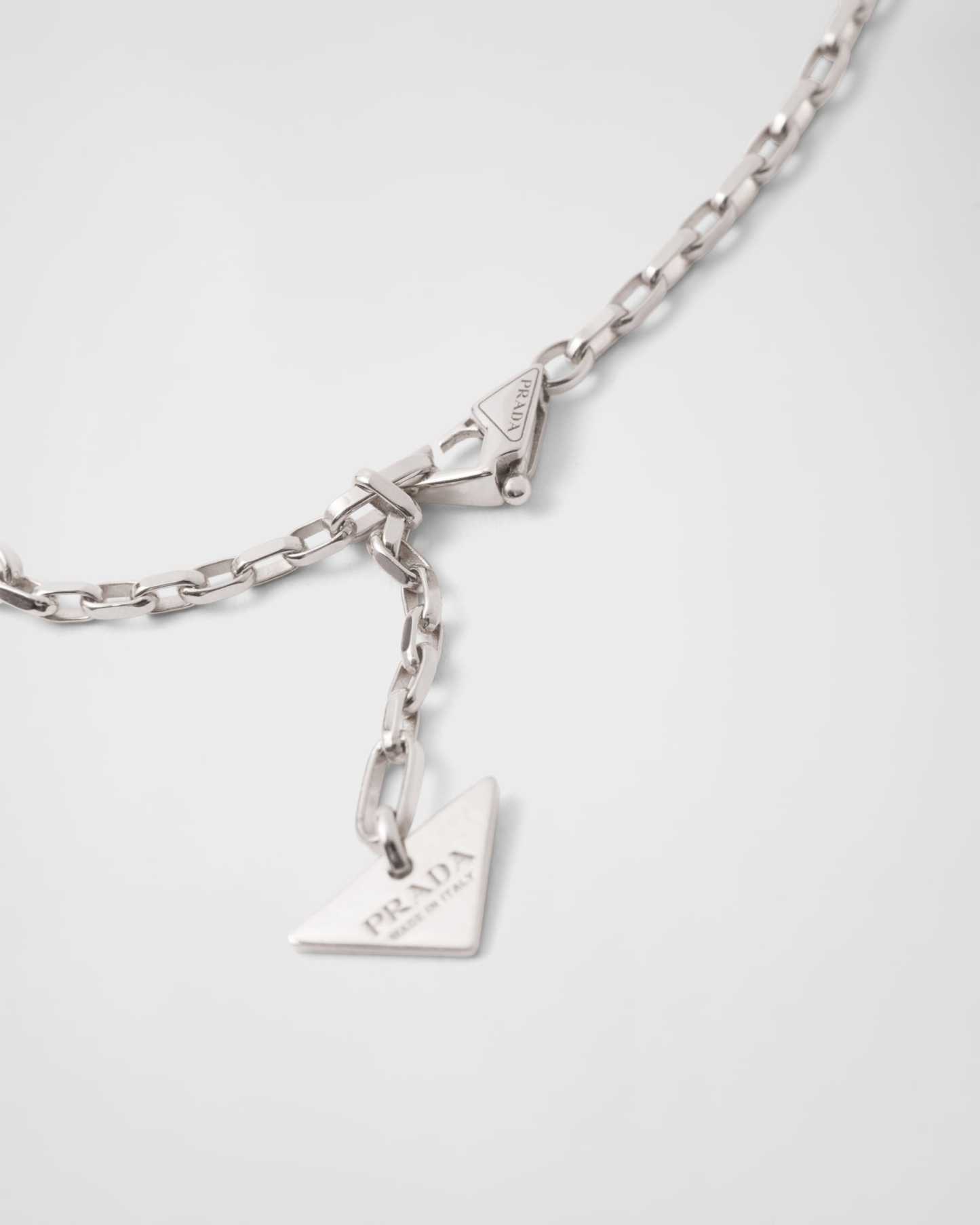 Eternal Gold mini triangle pendant necklace in white gold and diamonds