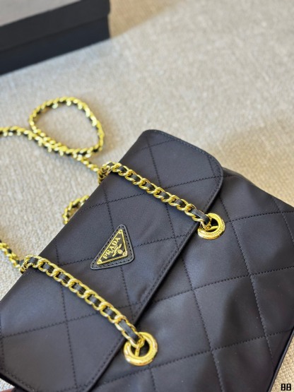 Enamel triangle logo quilted handbag