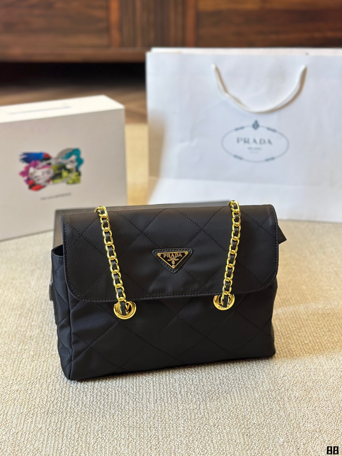 Enamel triangle logo quilted handbag