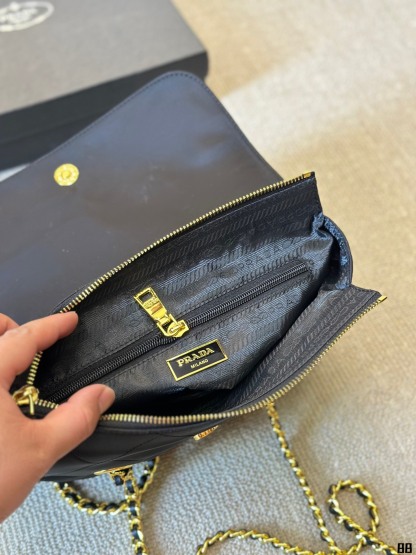 Enamel triangle logo quilted handbag