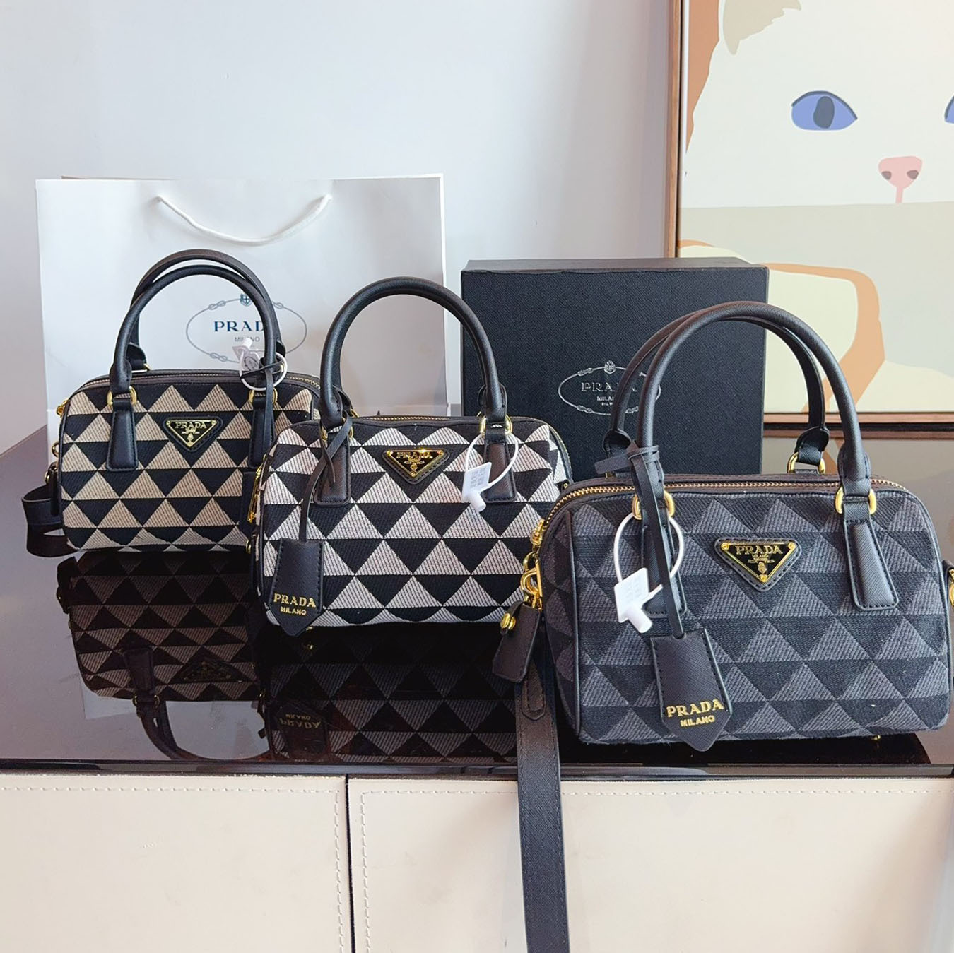 Symbole embroidered fabric top-handle bag