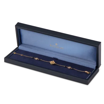 OPERA TULLE YELLOW GOLD BRACELET WITH ONYX LOGO