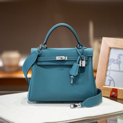KELLY 25 FIRST LAYER TOGO COWHIDE BLUE