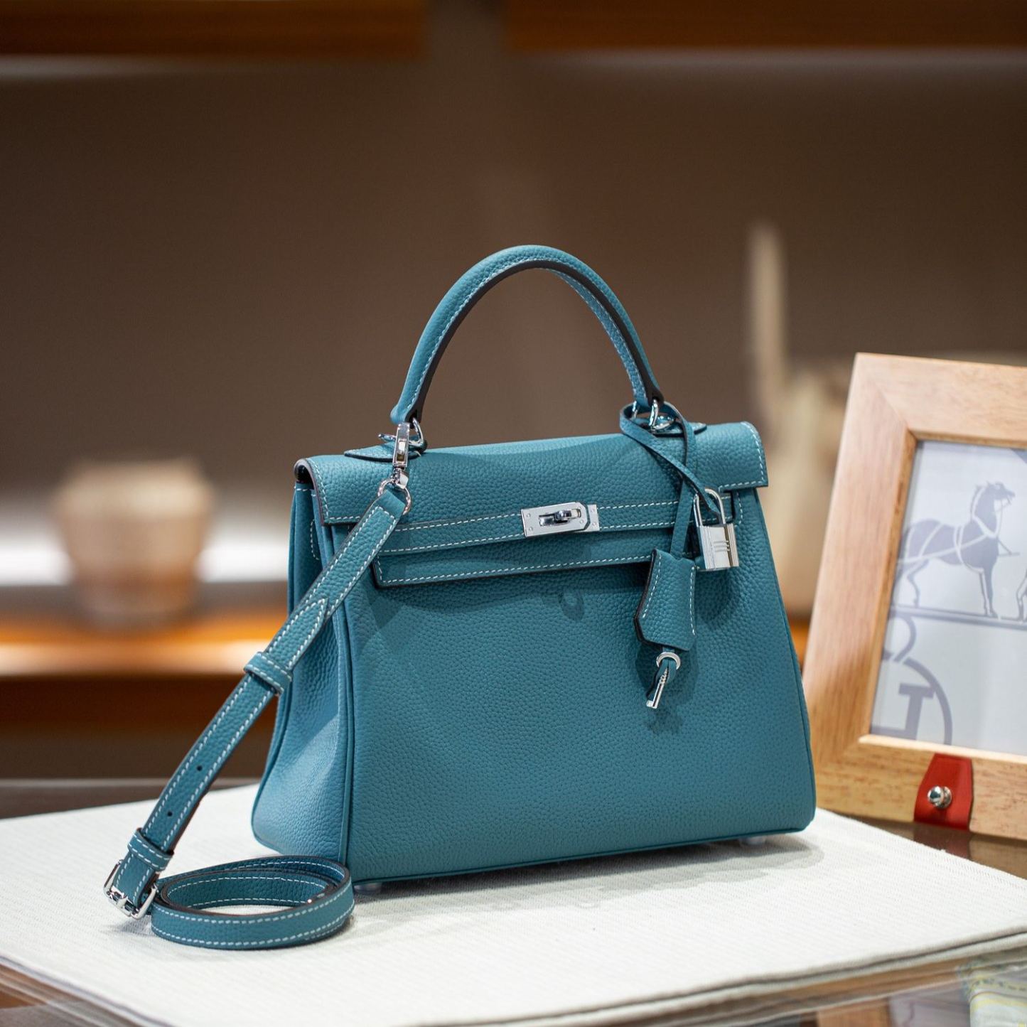 KELLY 25 FIRST LAYER TOGO COWHIDE BLUE