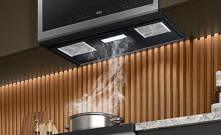 Pot boiling with steam going into Samsung Over the Range vent
