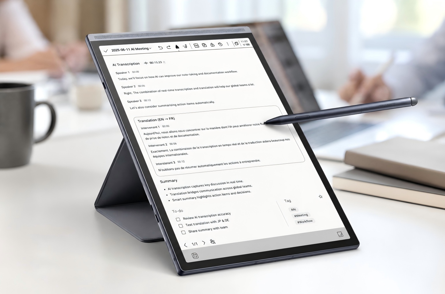 AINOTE tablet showing AI transcription and translation interface
