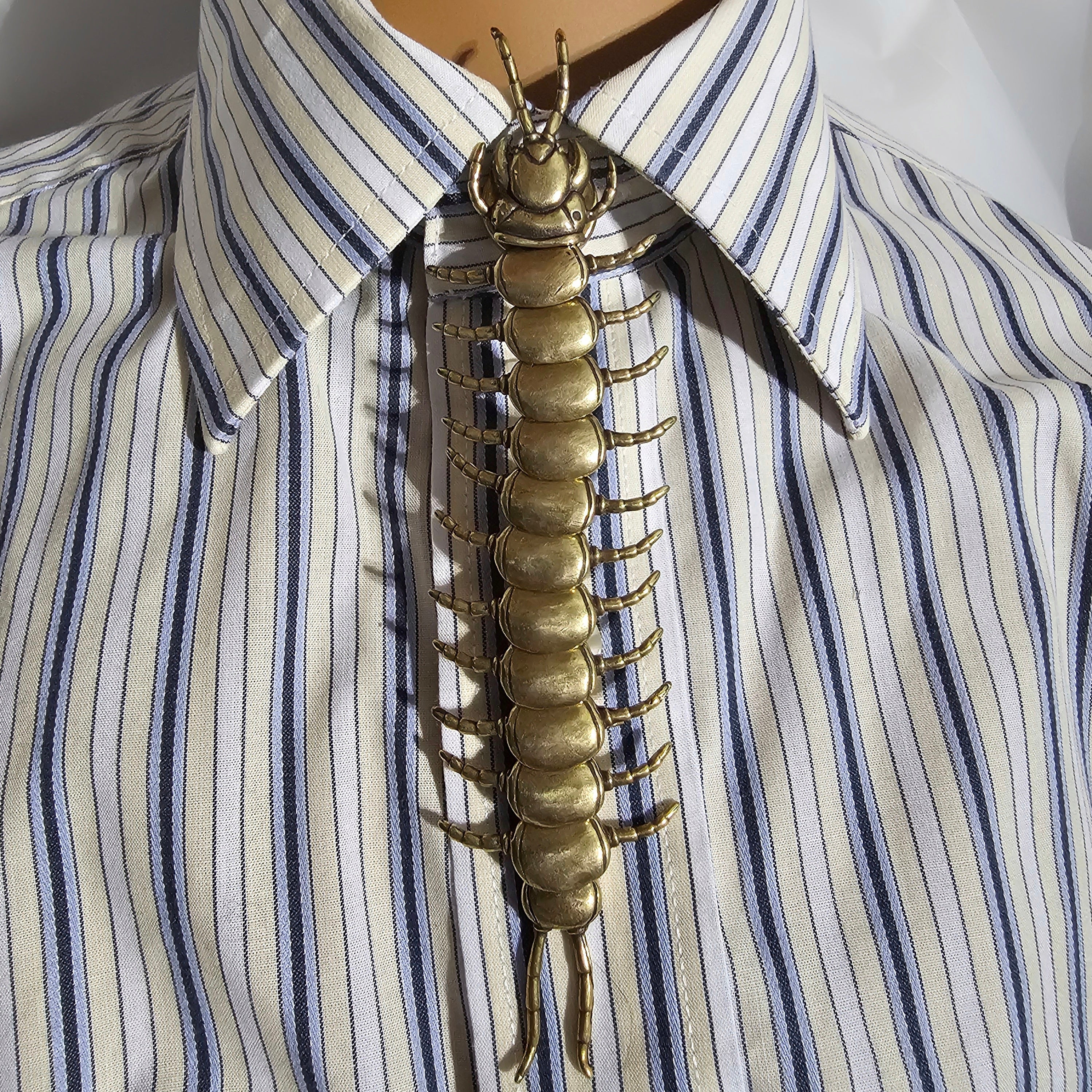 Centipede button cover