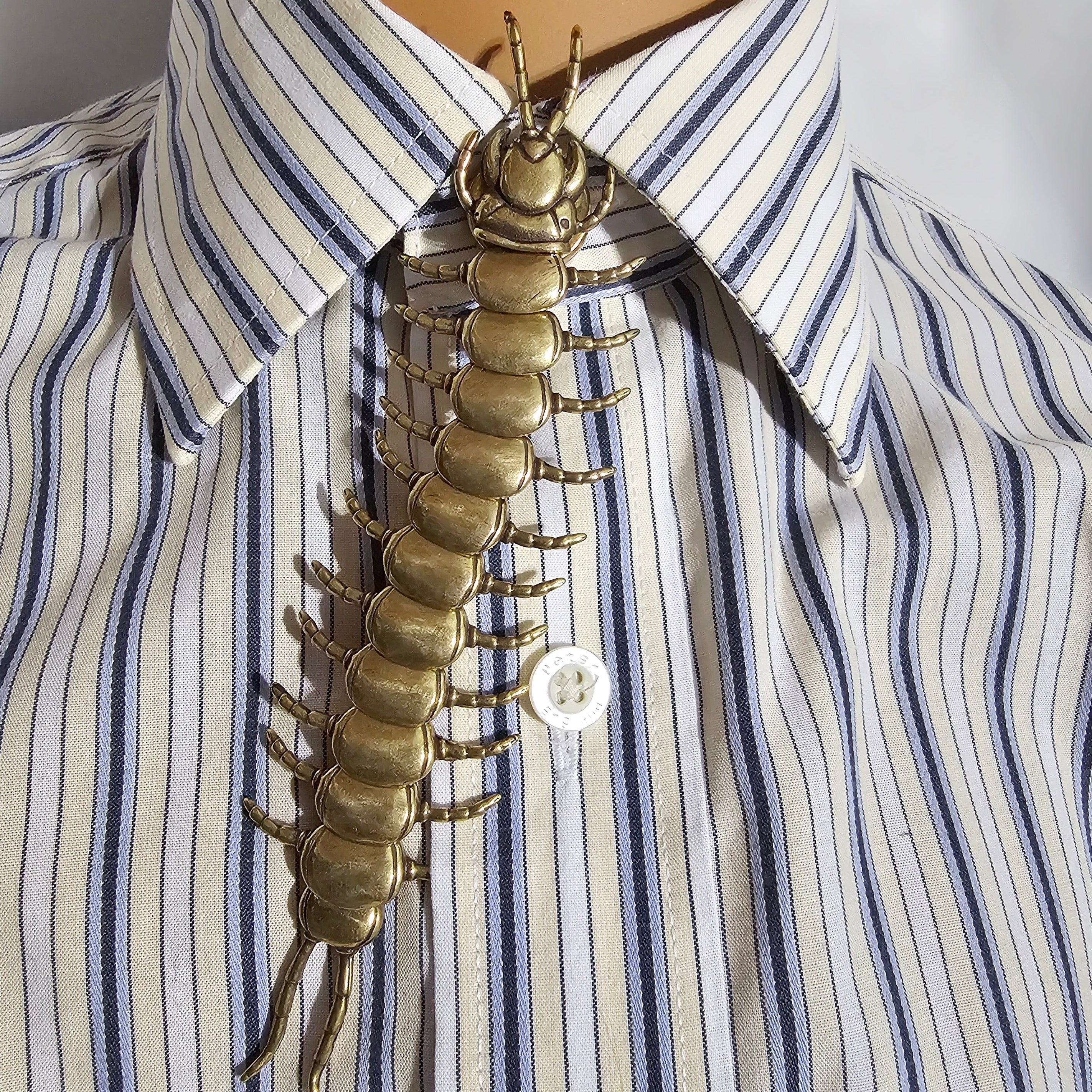 Centipede button cover