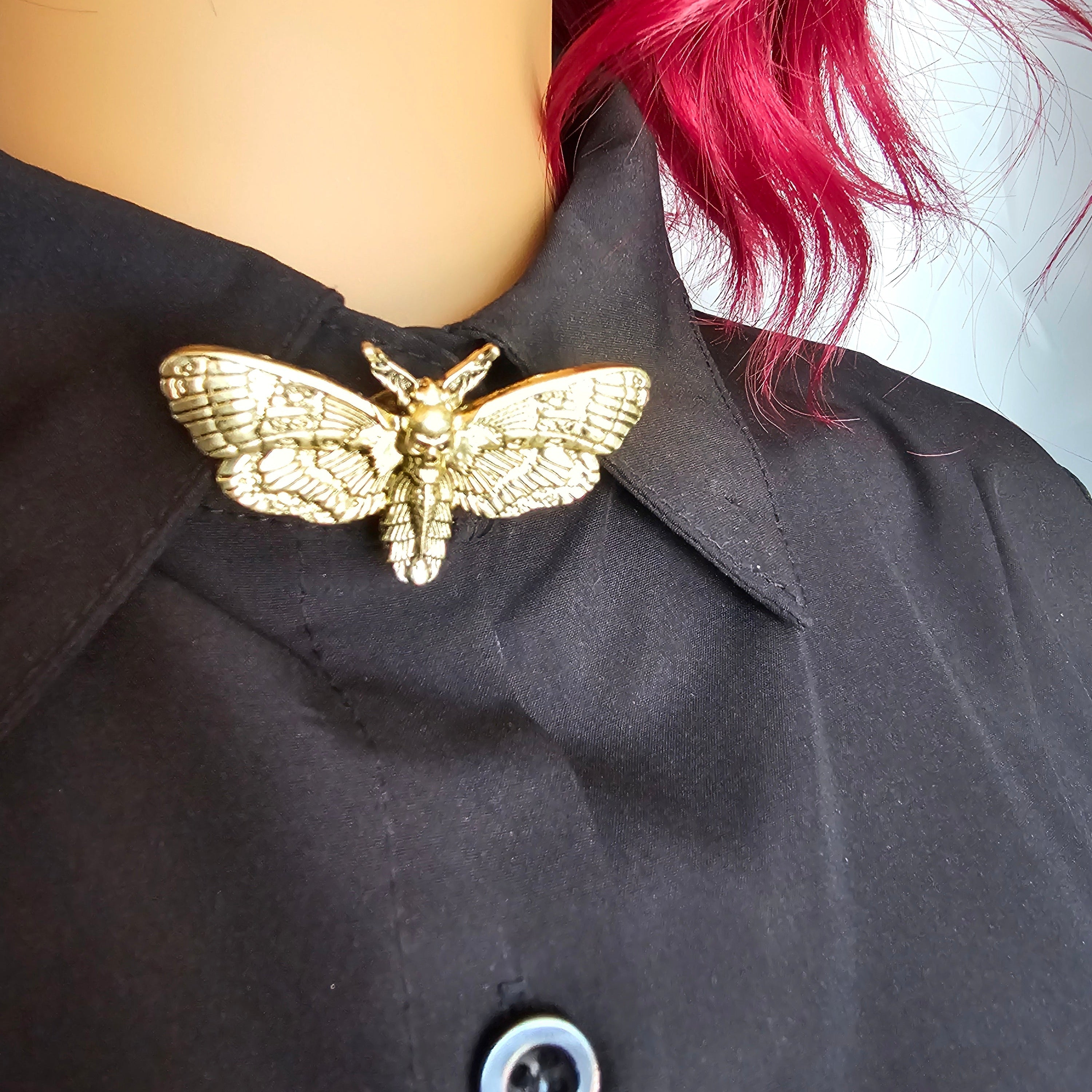 Light gold moth button cover