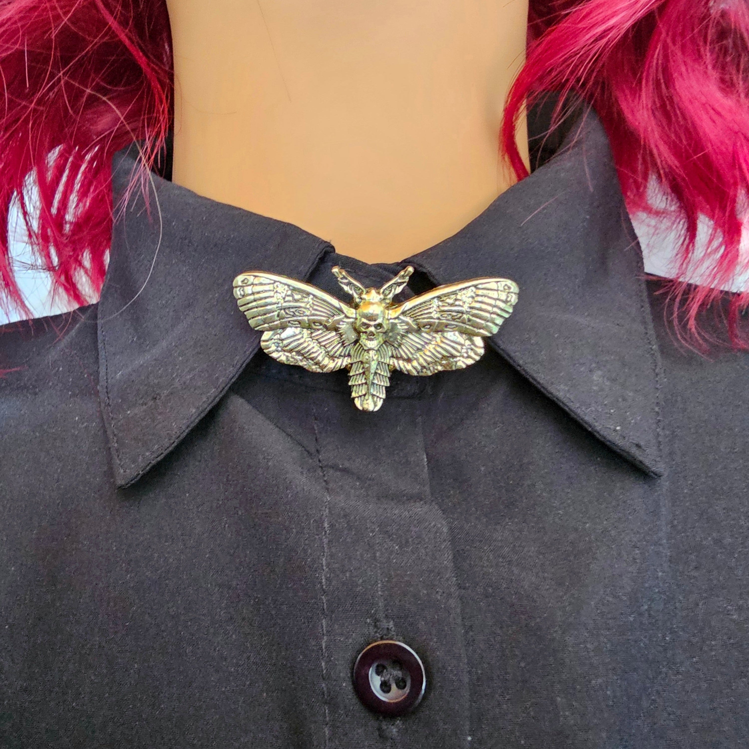 Light gold moth button cover