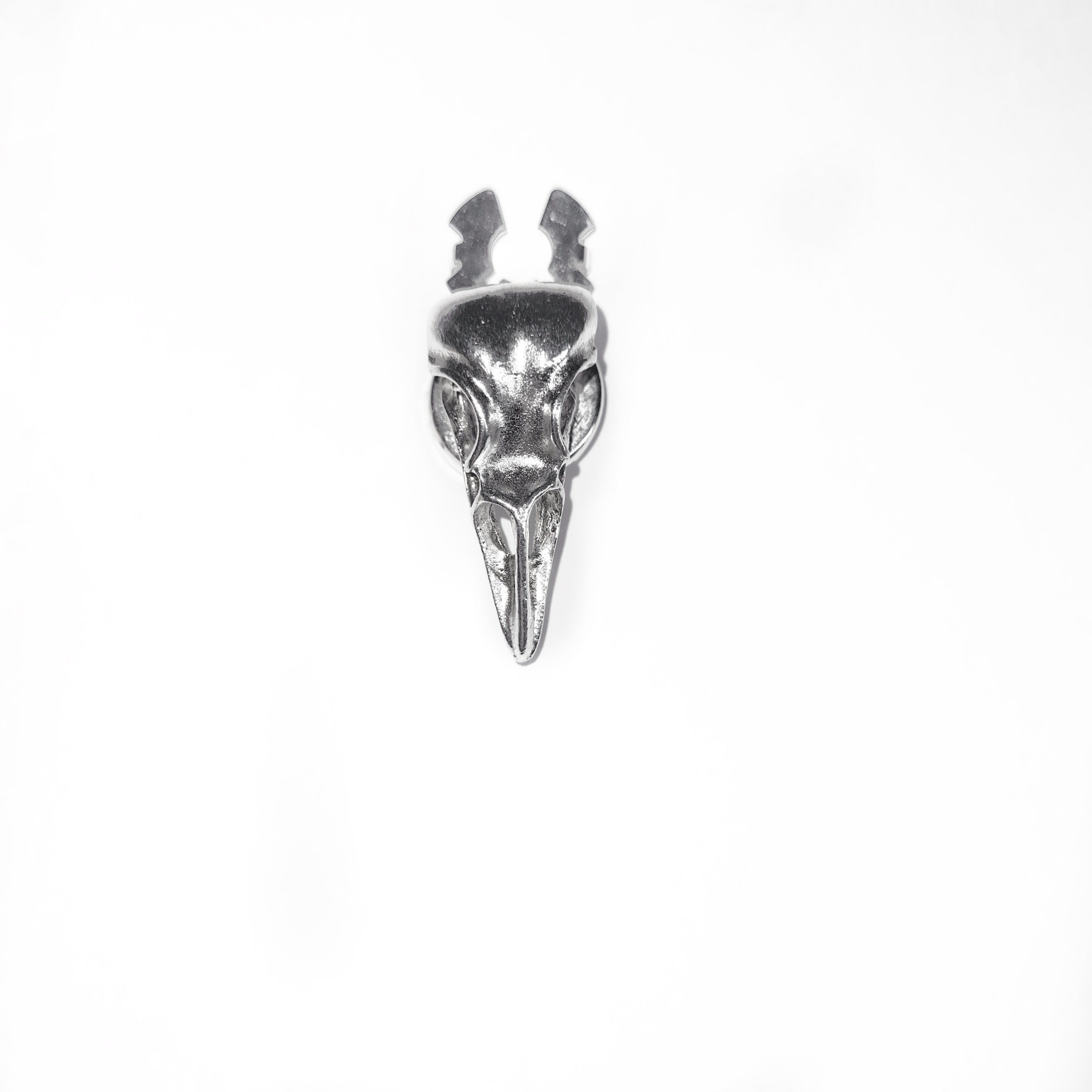 Bird skull button cover