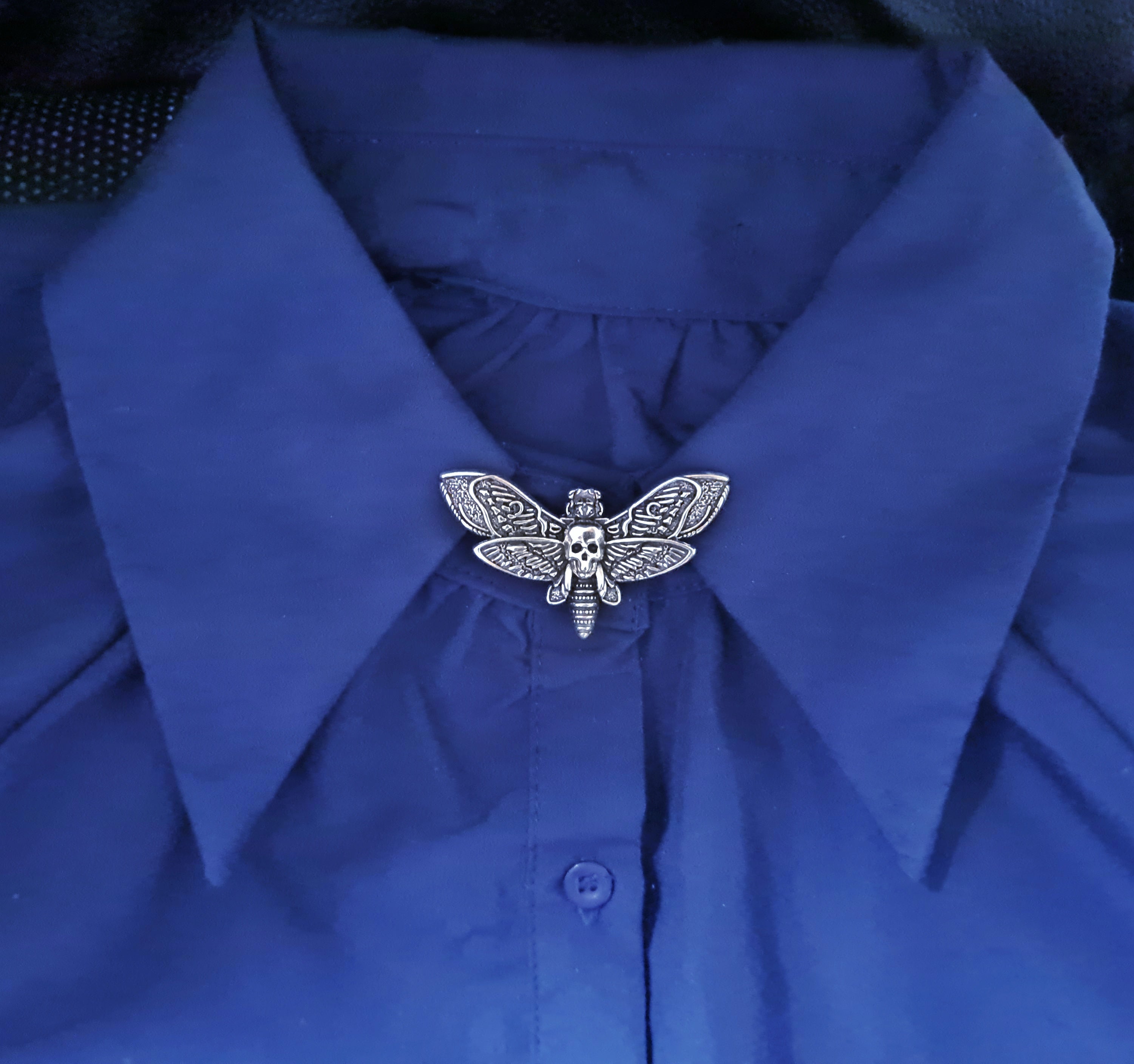 Moth button cover