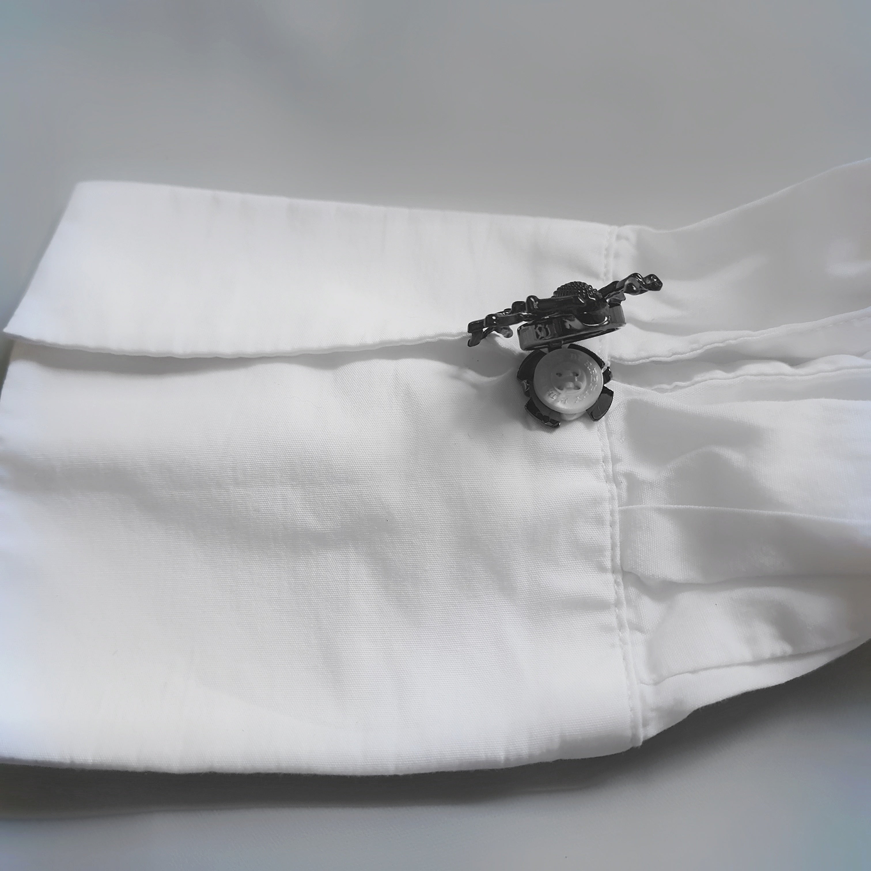 Black spider button cover