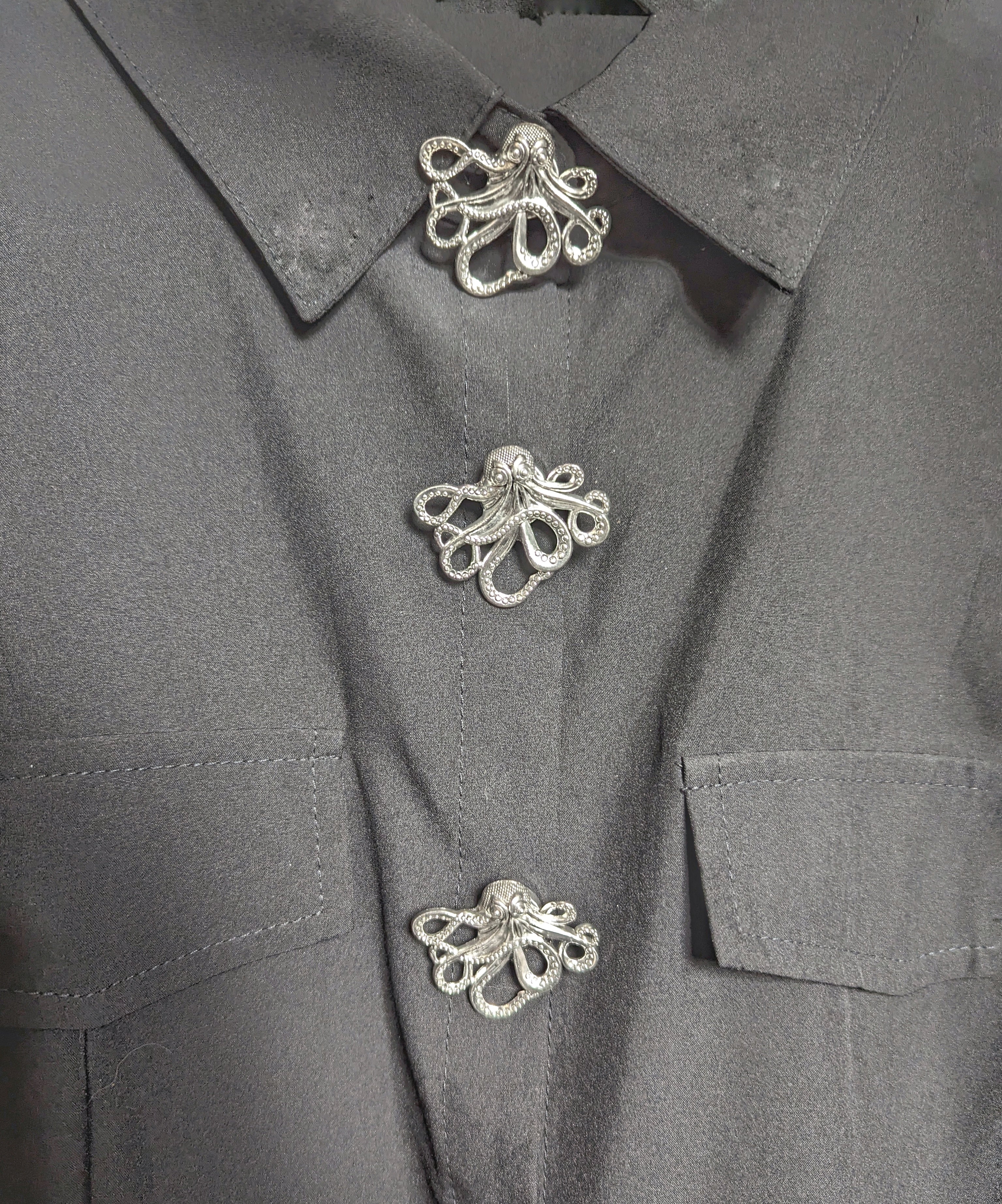 Octopus button cover