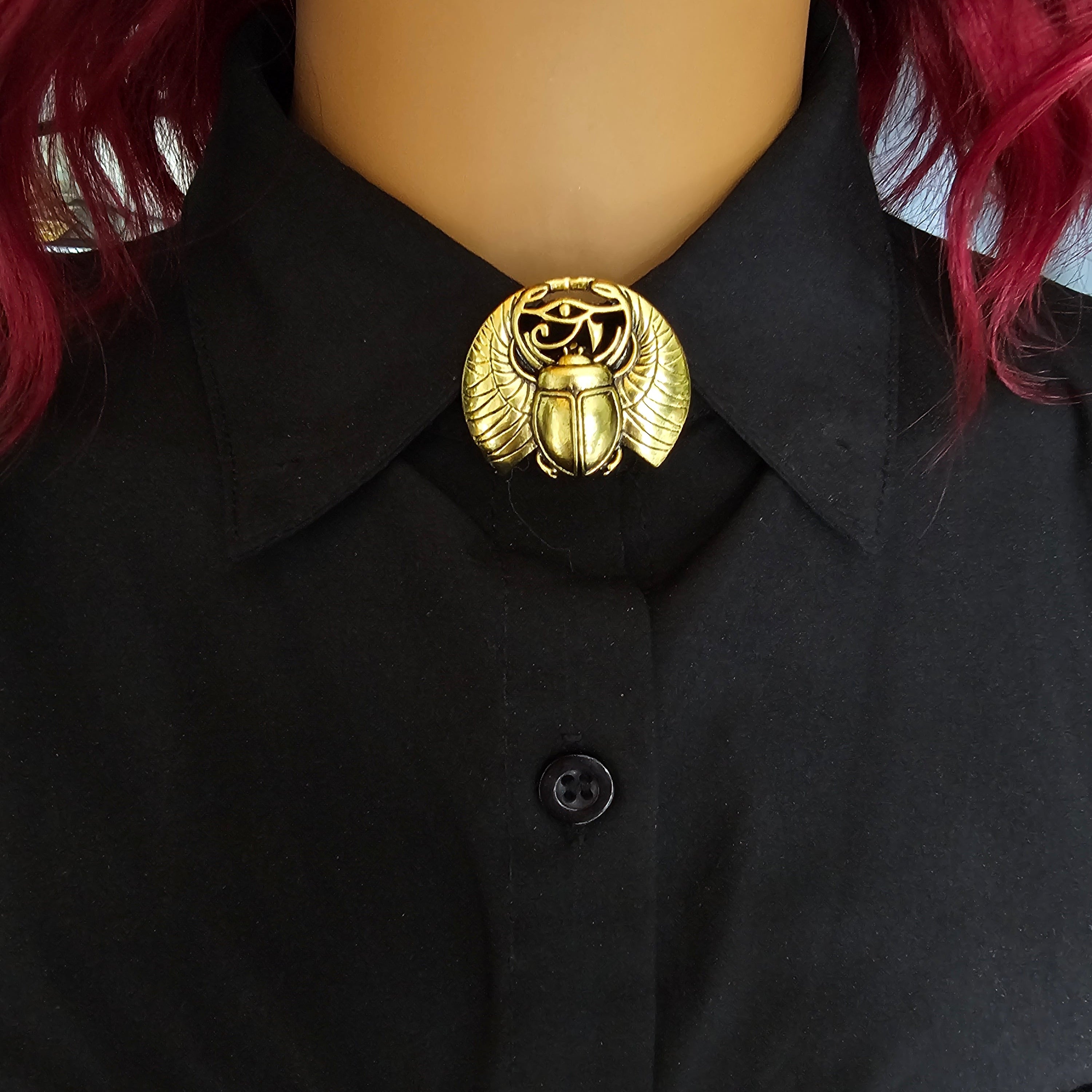 Gold scarab button cover