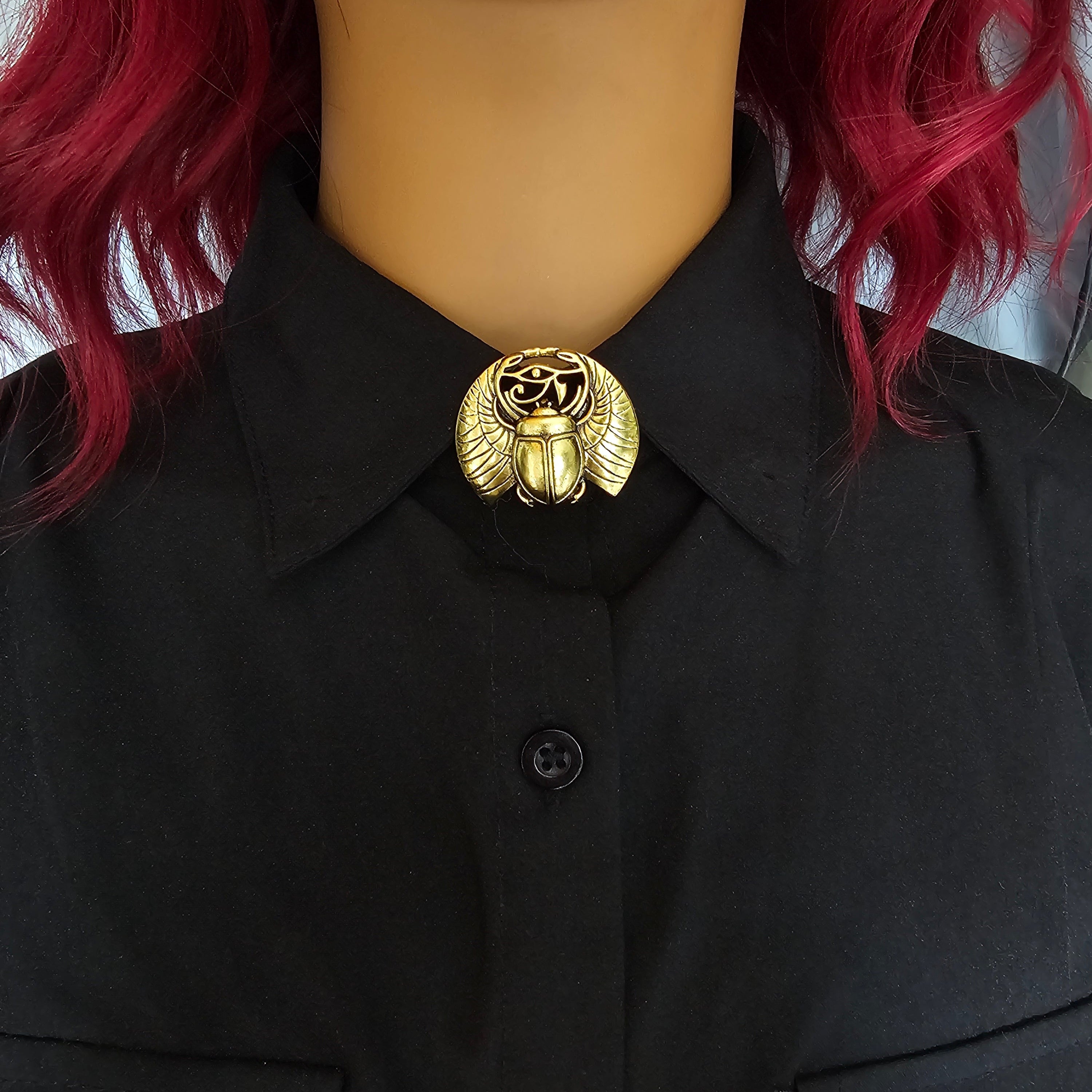 Gold scarab button cover