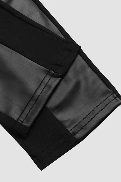 Pantaloni in finta pelle con finiture a contrasto e cerniera