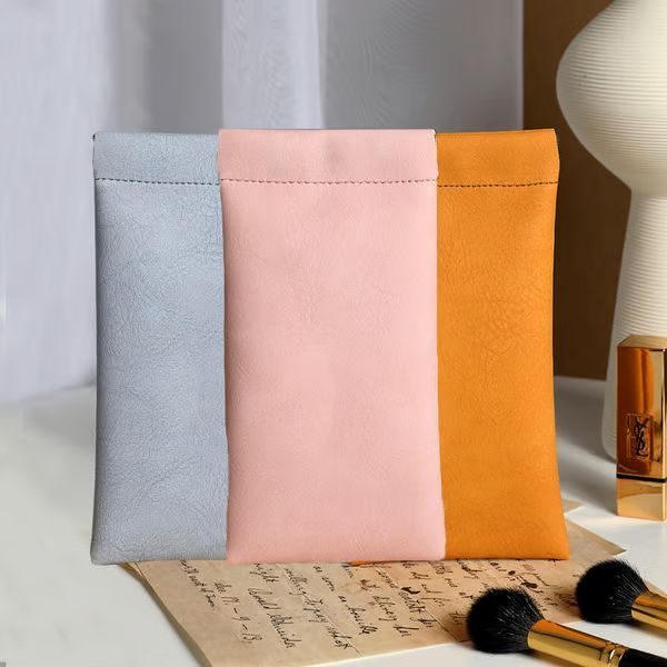 🔥Borsa portaoggetti in pelle con bottone automatico