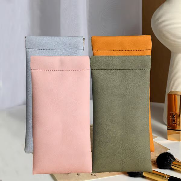 🔥Borsa portaoggetti in pelle con bottone automatico