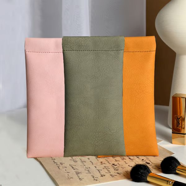 🔥Borsa portaoggetti in pelle con bottone automatico