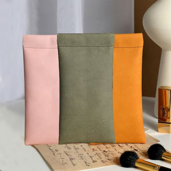 🔥Borsa portaoggetti in pelle con bottone automatico