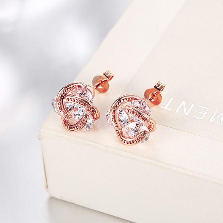 Swarovski Crystal Knot Stud Earrings Set in Rose Gold - Riakoob Jewelry www.goldennycjewelry.com fashion jewelry for women