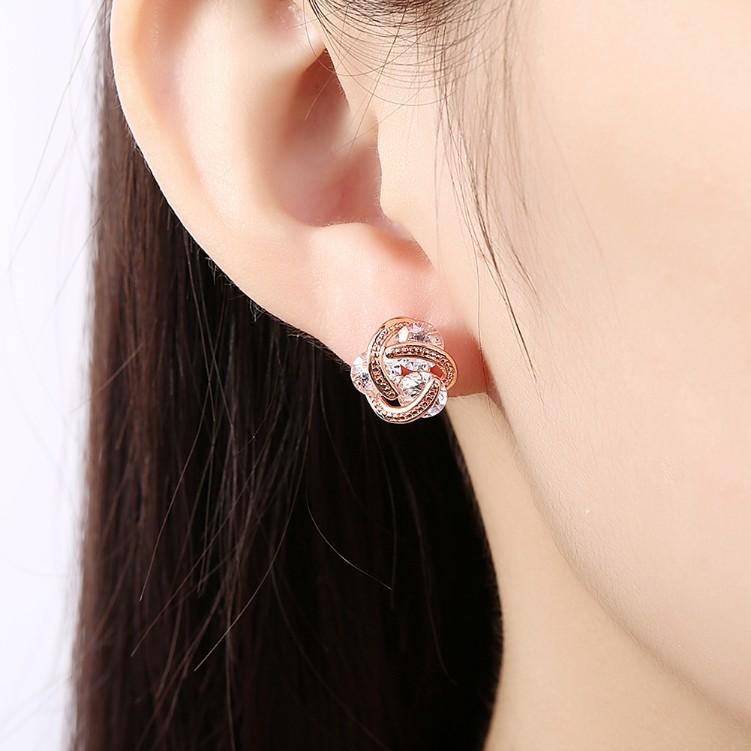 Swarovski Crystal Knot Stud Earrings Set in Rose Gold - Riakoob Jewelry www.goldennycjewelry.com fashion jewelry for women