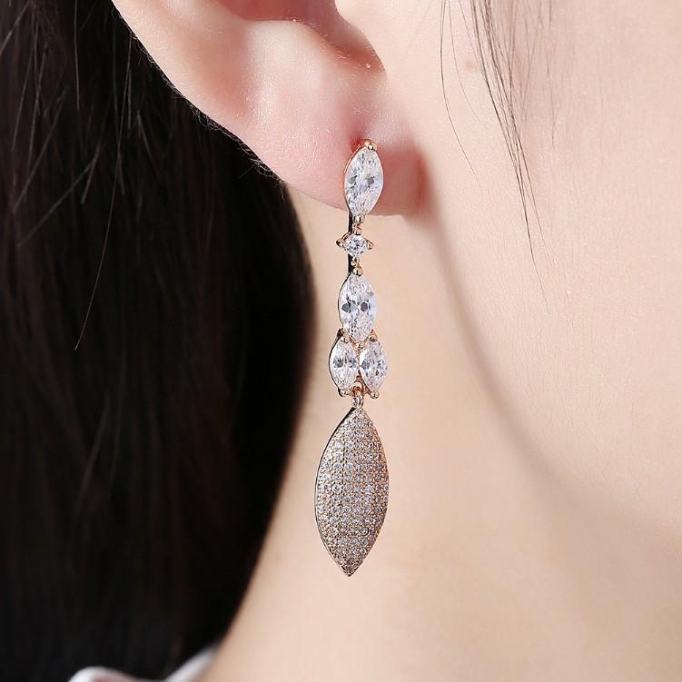 Luxe Crystal Micro-Pav'e Dangling Pear Shaped Earrings Set in Goldtone - Riakoob Jewelry