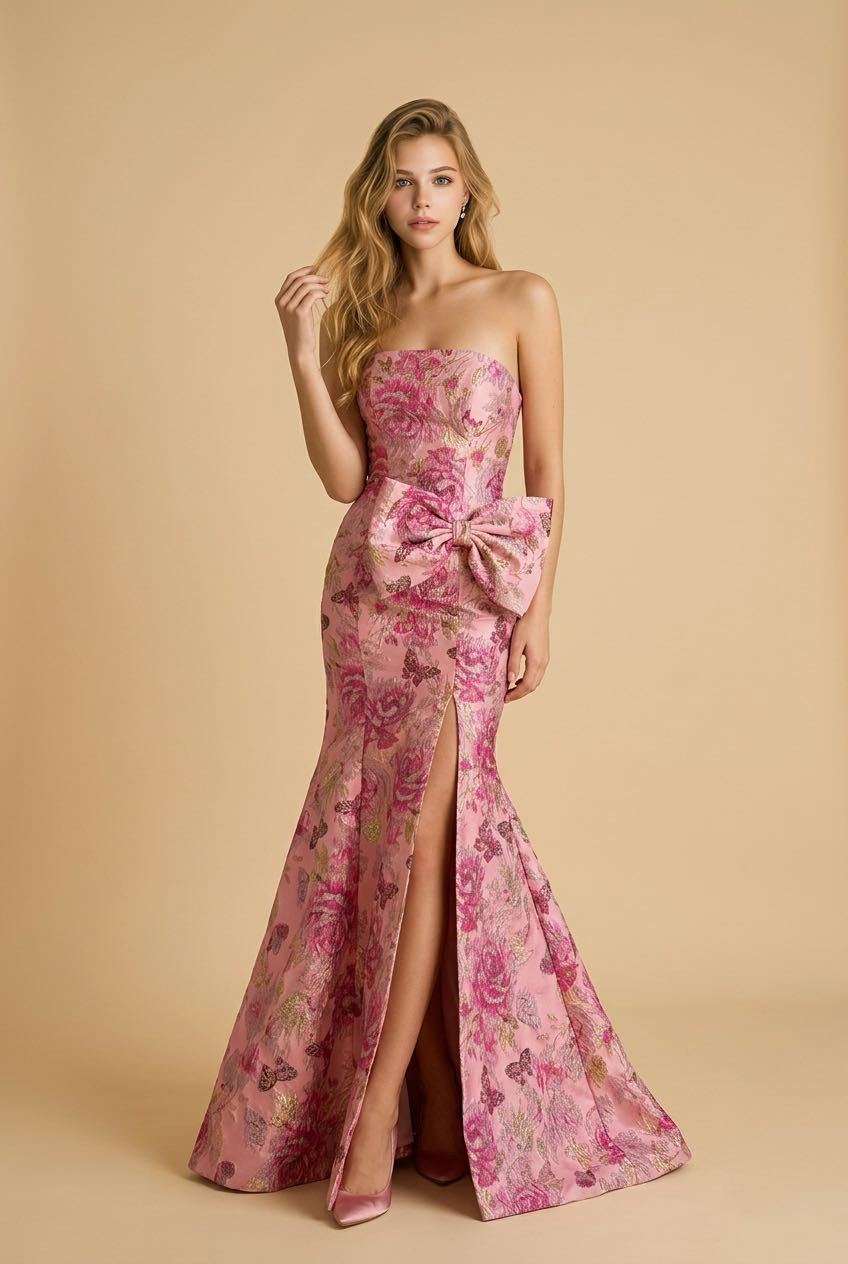 #3717 Strapless brocade gown with skirt and bow on hip. 