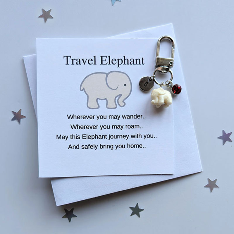 Cream Travel elephant keychain