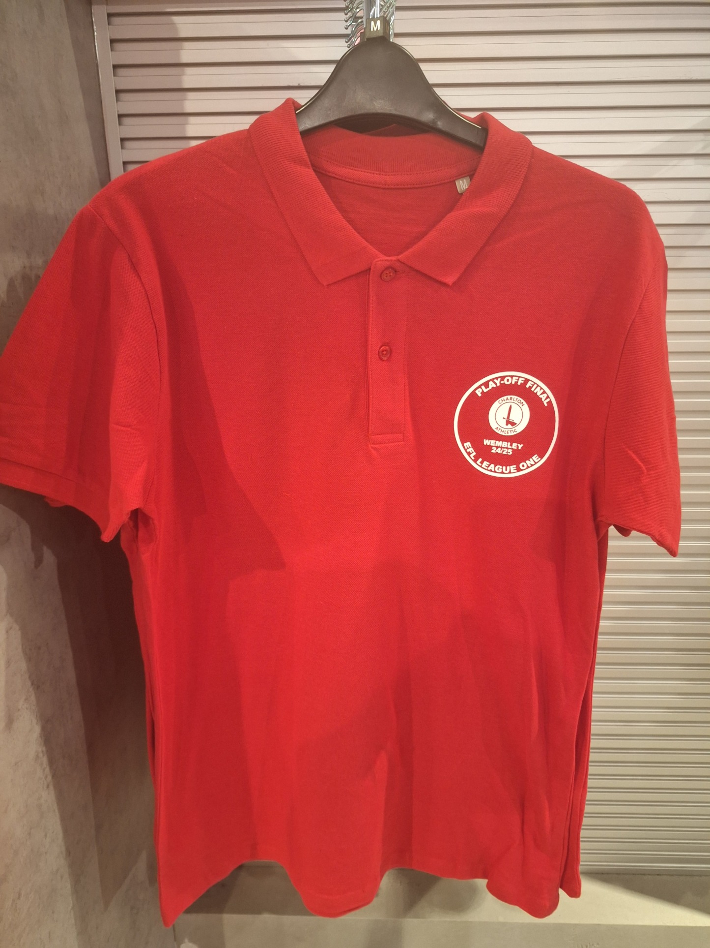 Red Circle Badge Playoff Finale polo 