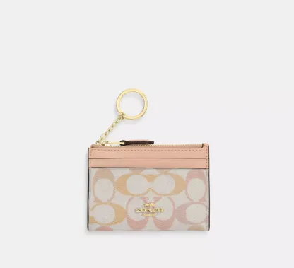 Mini Skinny Id Case In Signature Canvas