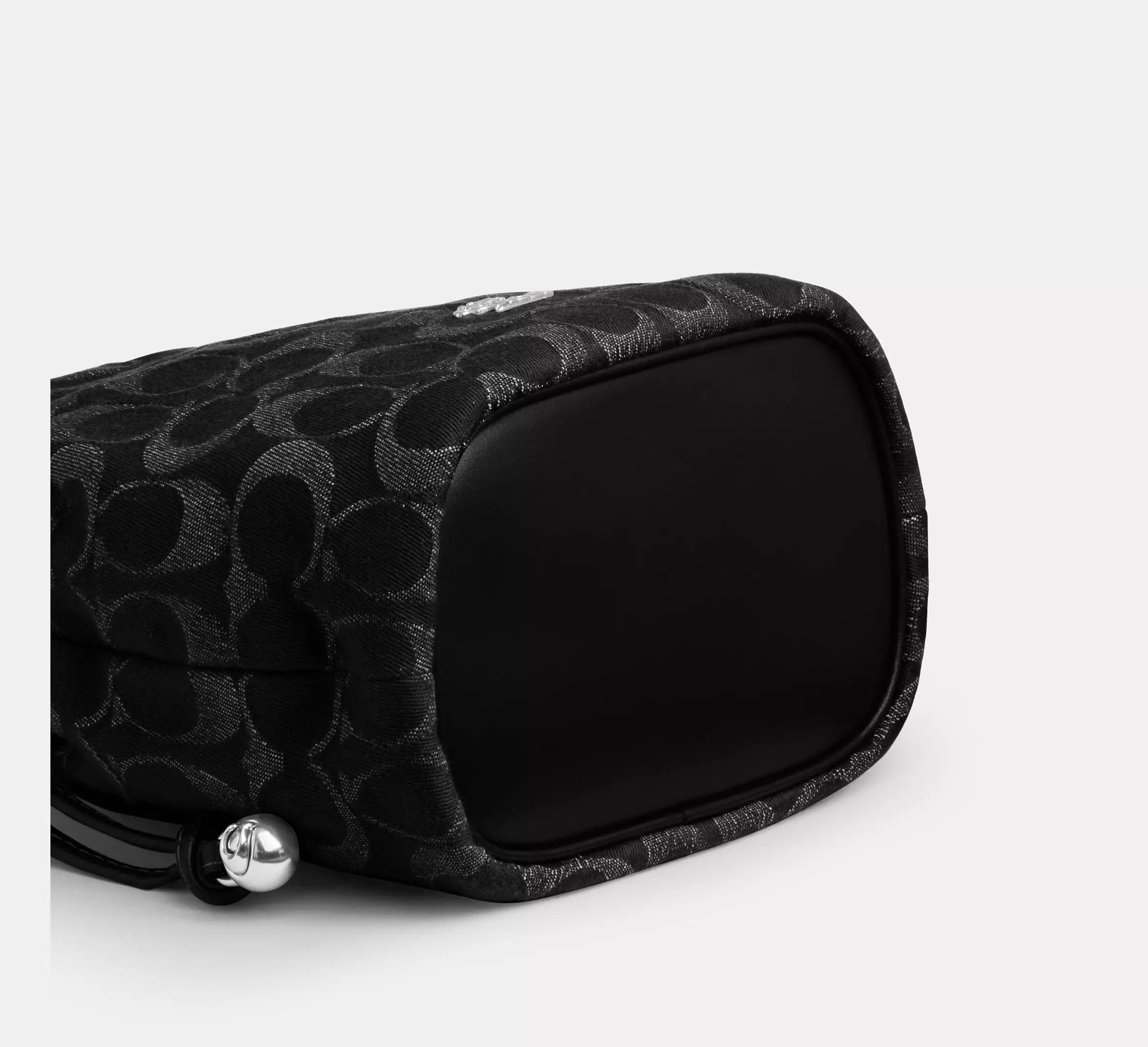 Faye Mini Drawstring Bag In Signature Denim