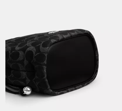 Faye Mini Drawstring Bag In Signature Denim