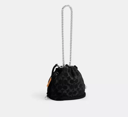 Faye Mini Drawstring Bag In Signature Denim