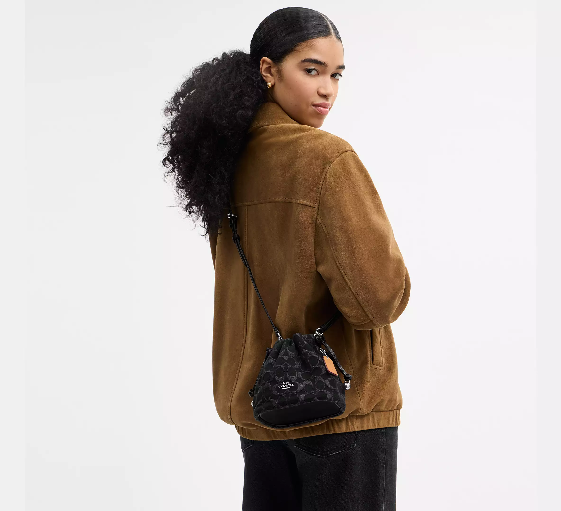 Faye Mini Drawstring Bag In Signature Denim