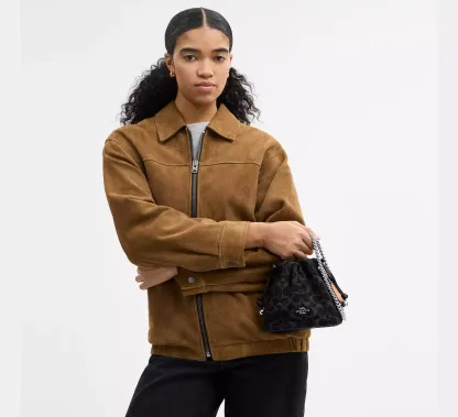 Faye Mini Drawstring Bag In Signature Denim