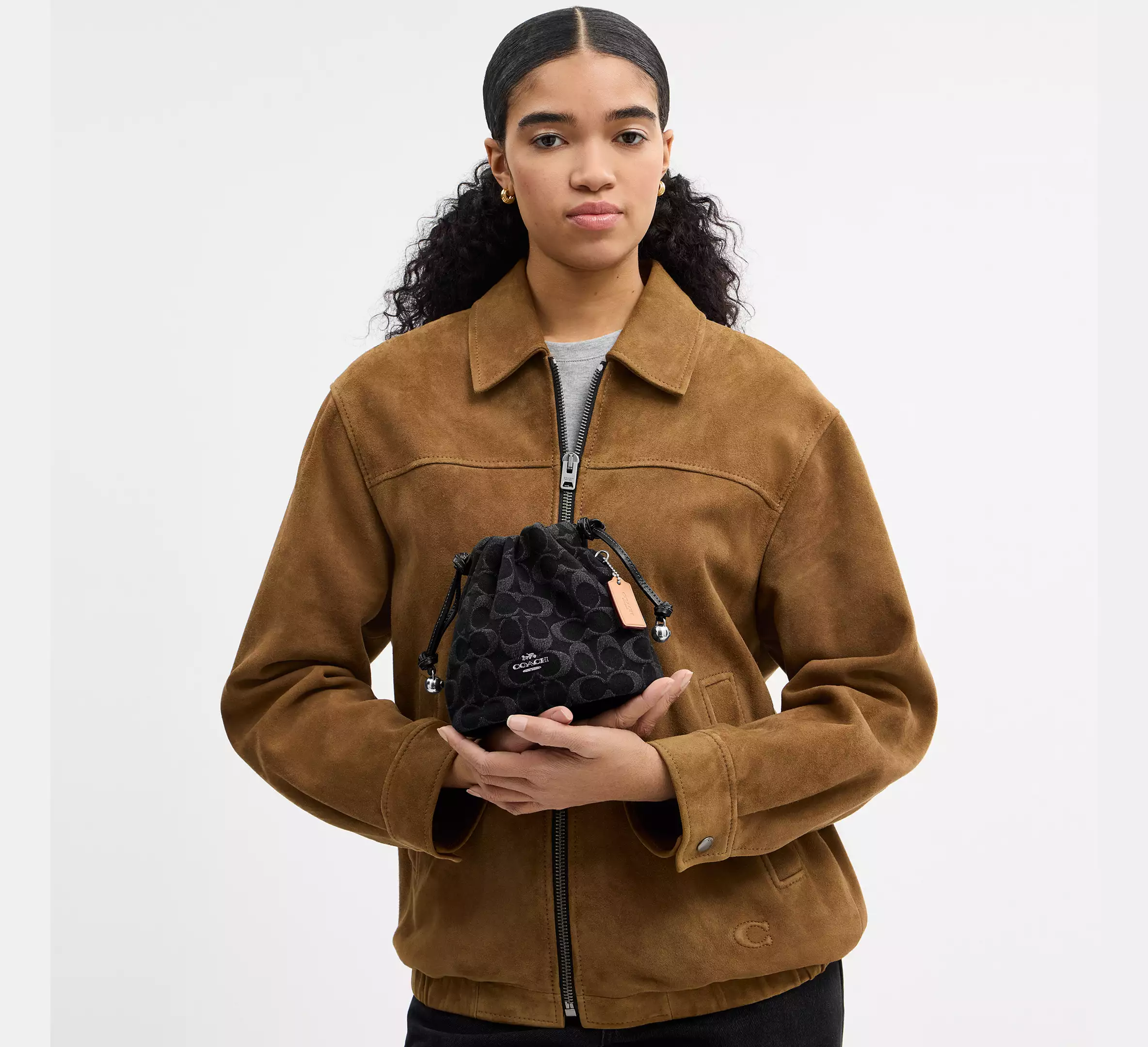 Faye Mini Drawstring Bag In Signature Denim