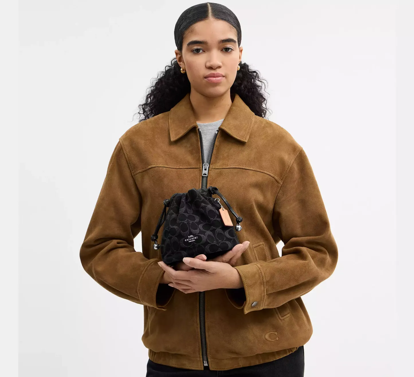 Faye Mini Drawstring Bag In Signature Denim