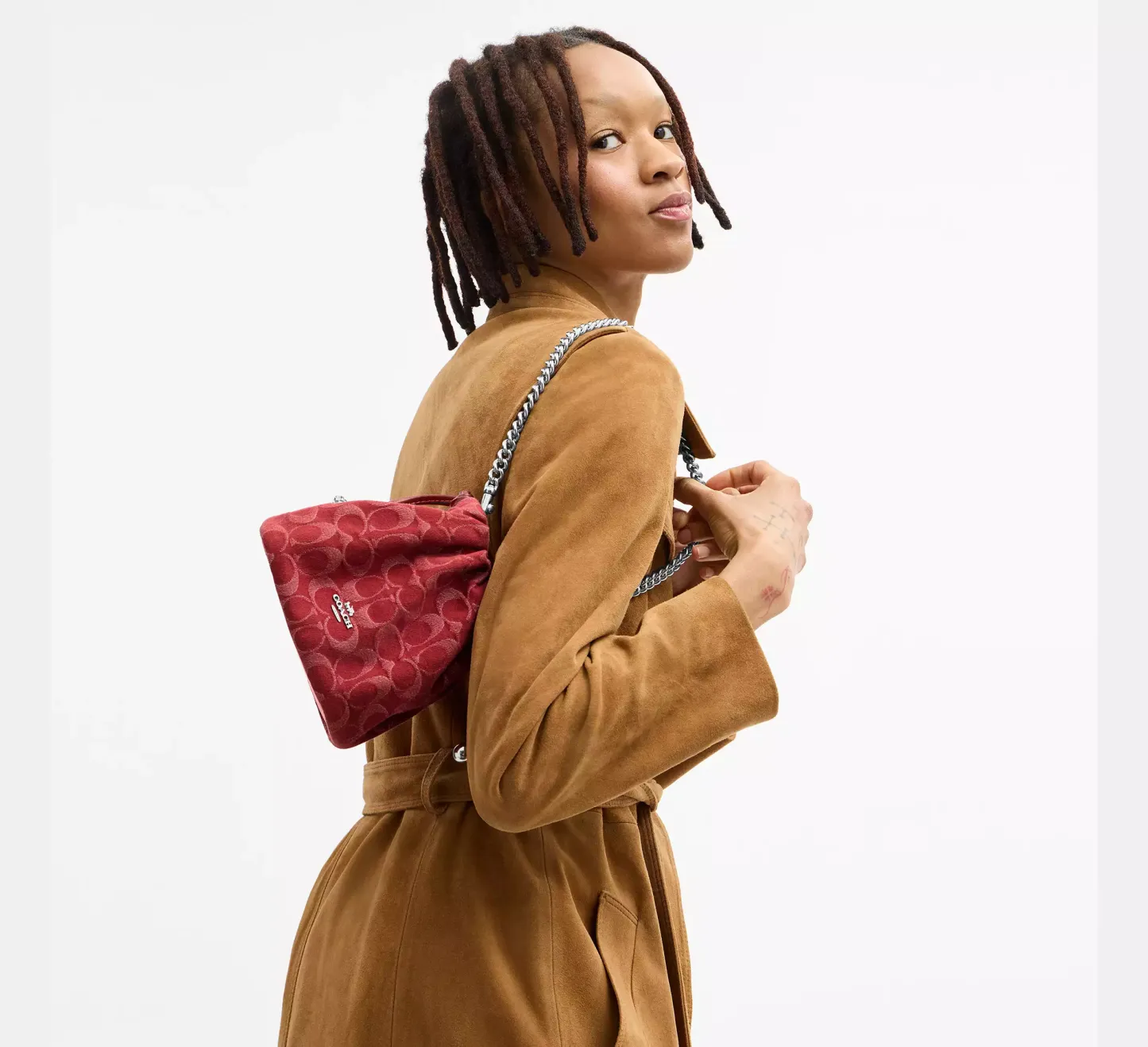 Faye Mini Drawstring Bag In Signature Denim