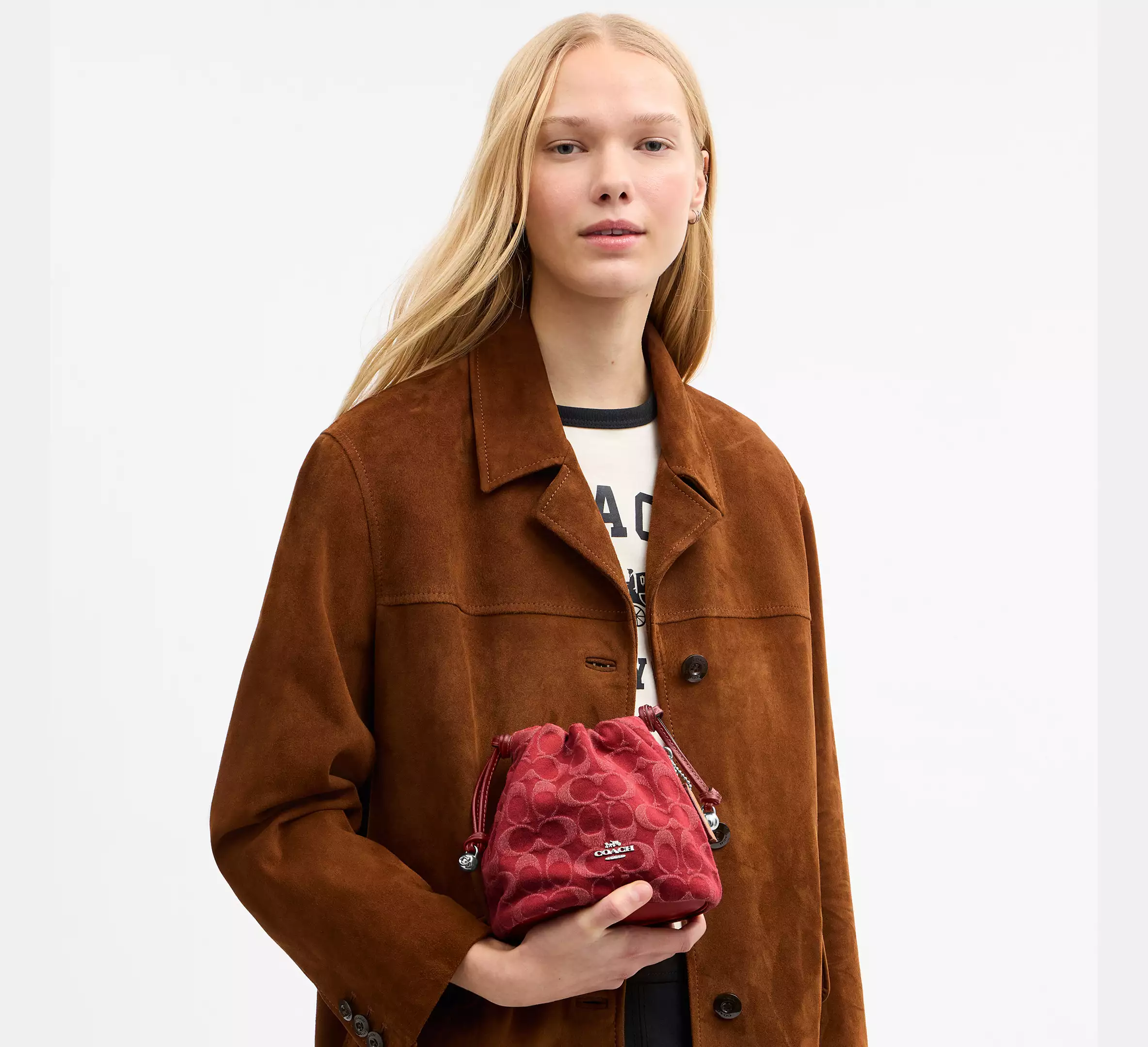 Faye Mini Drawstring Bag In Signature Denim