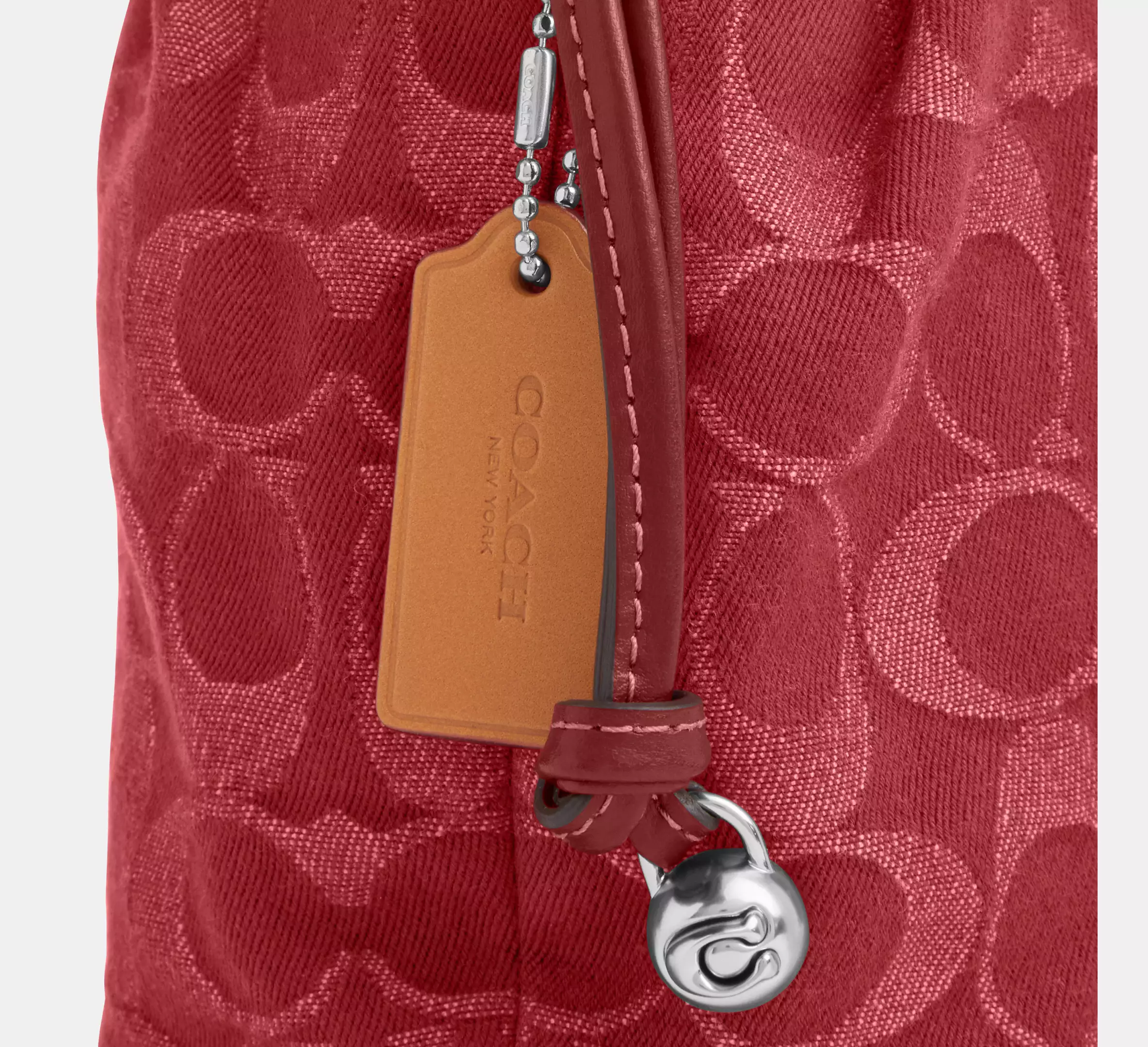 Faye Mini Drawstring Bag In Signature Denim